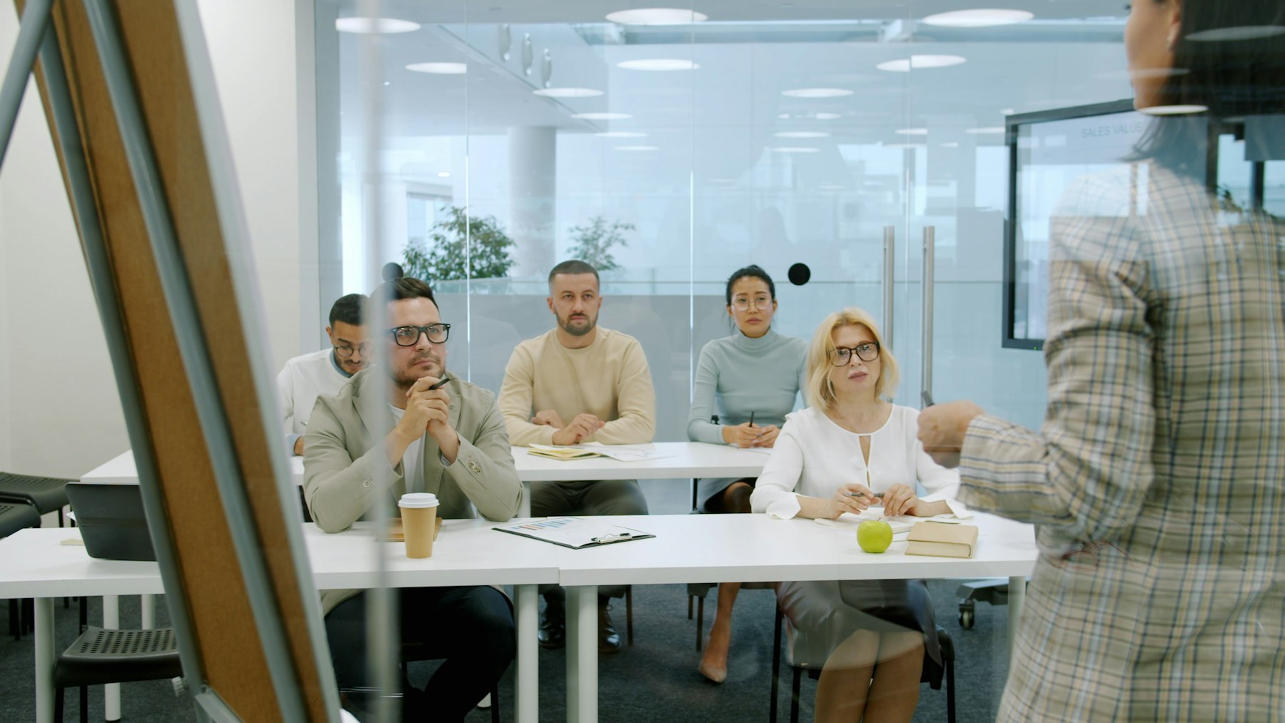 Professionals attending a briefing